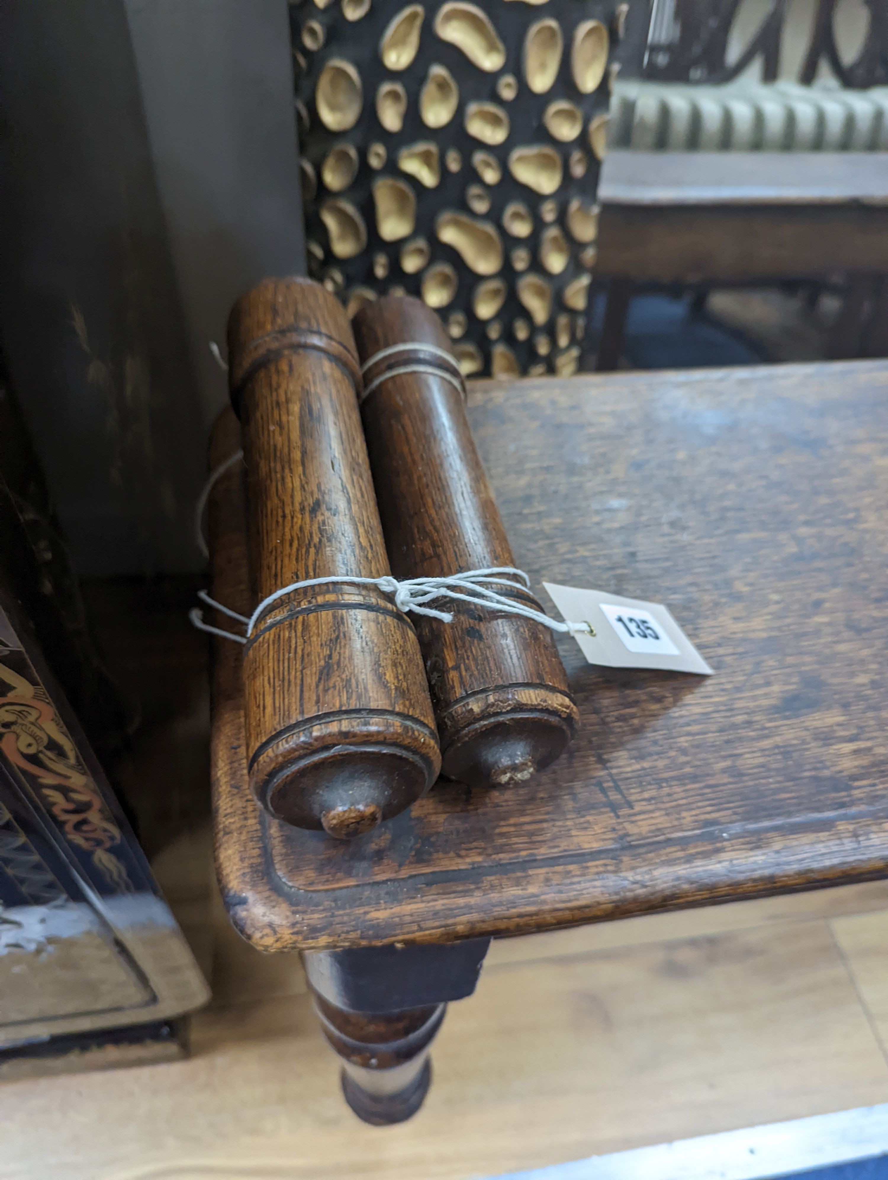 A Victorian oak window seat W-107cm, D-28cm, H-53cm, one handle bar detached but present